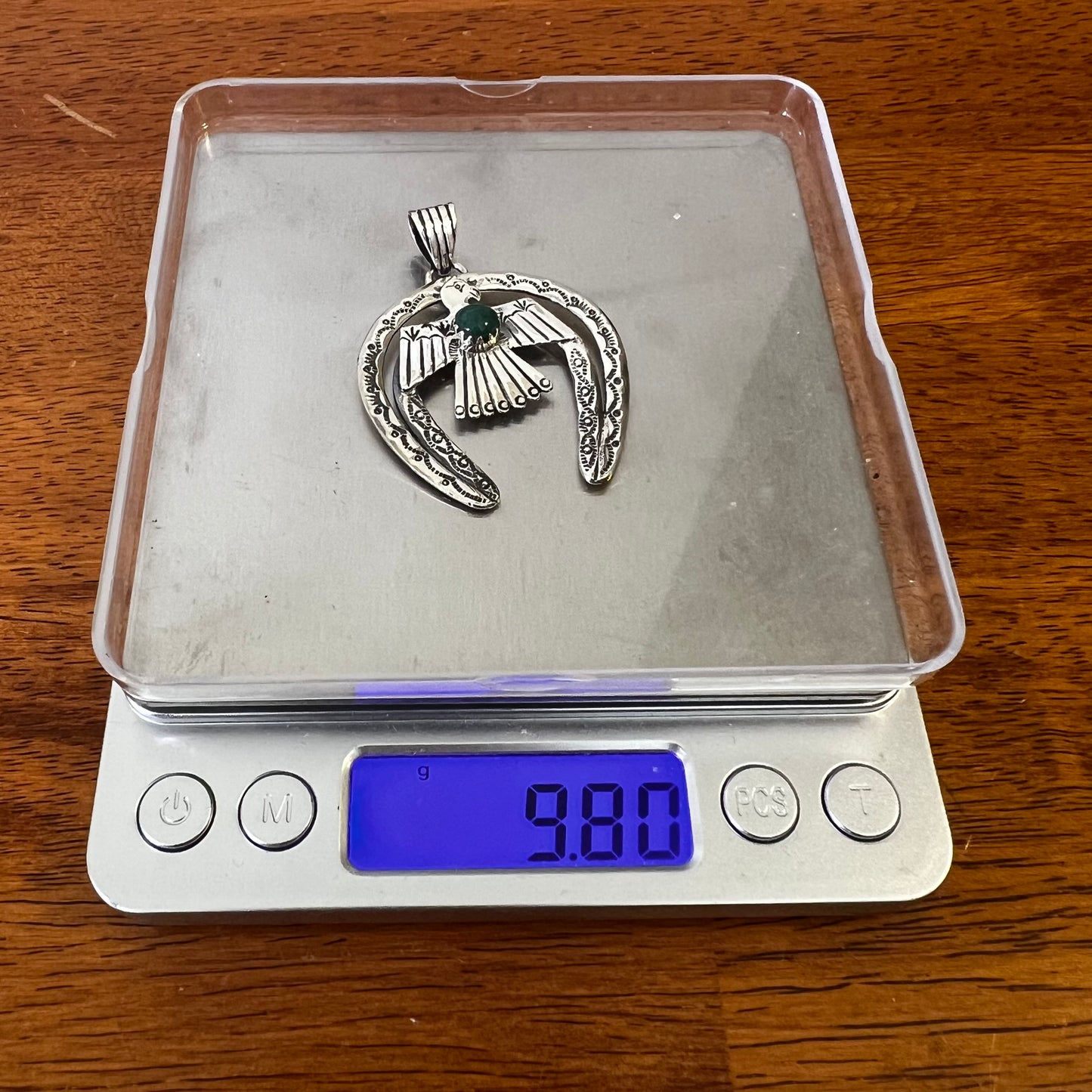 Kingman Turquoise Thunderbird Naja Pendant | Sterling Silver