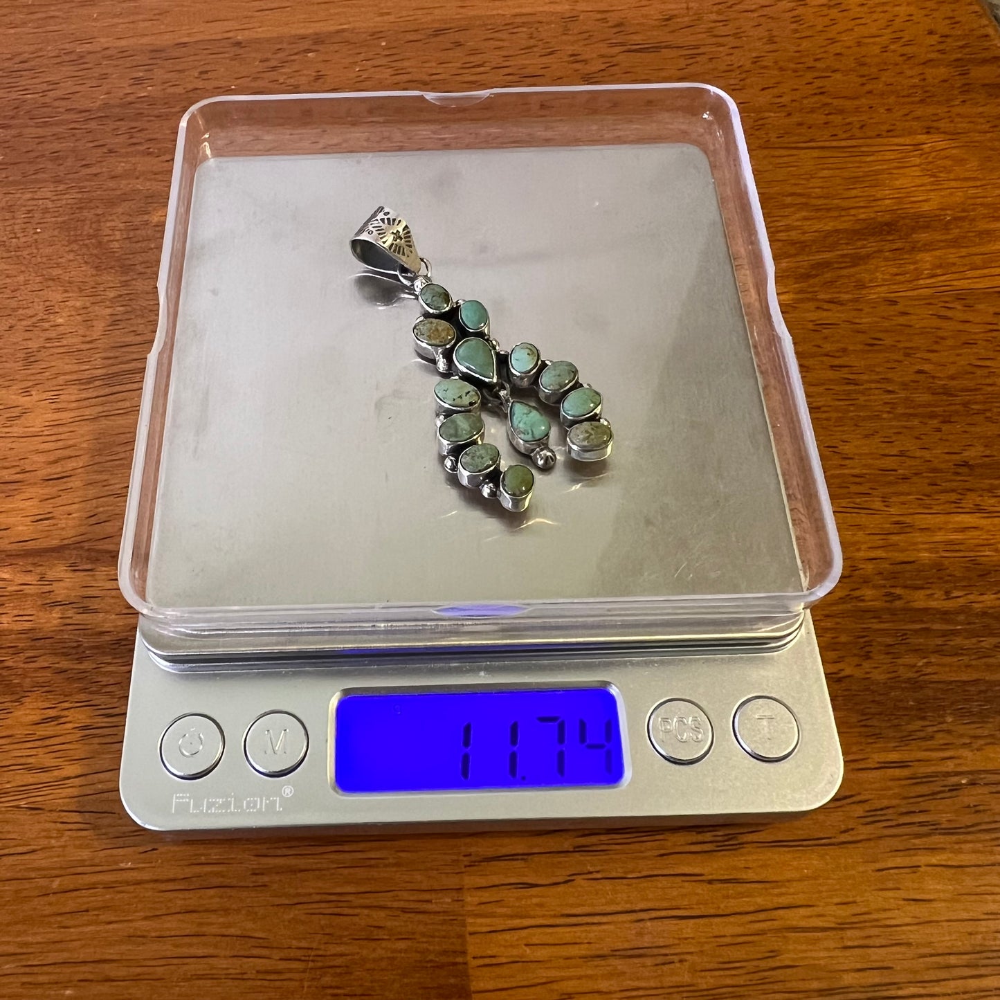 Kingman Turquoise Cluster Naja Pendant – Sterling Silver Southwestern