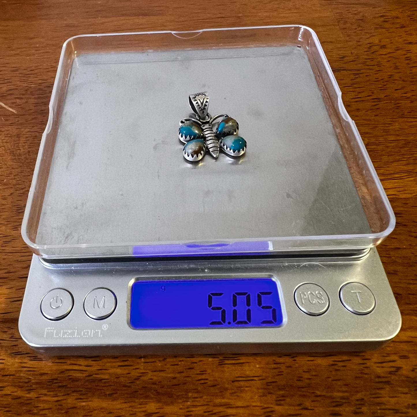 Sterling Silver Ribbon Turquoise Butterfly Pendant