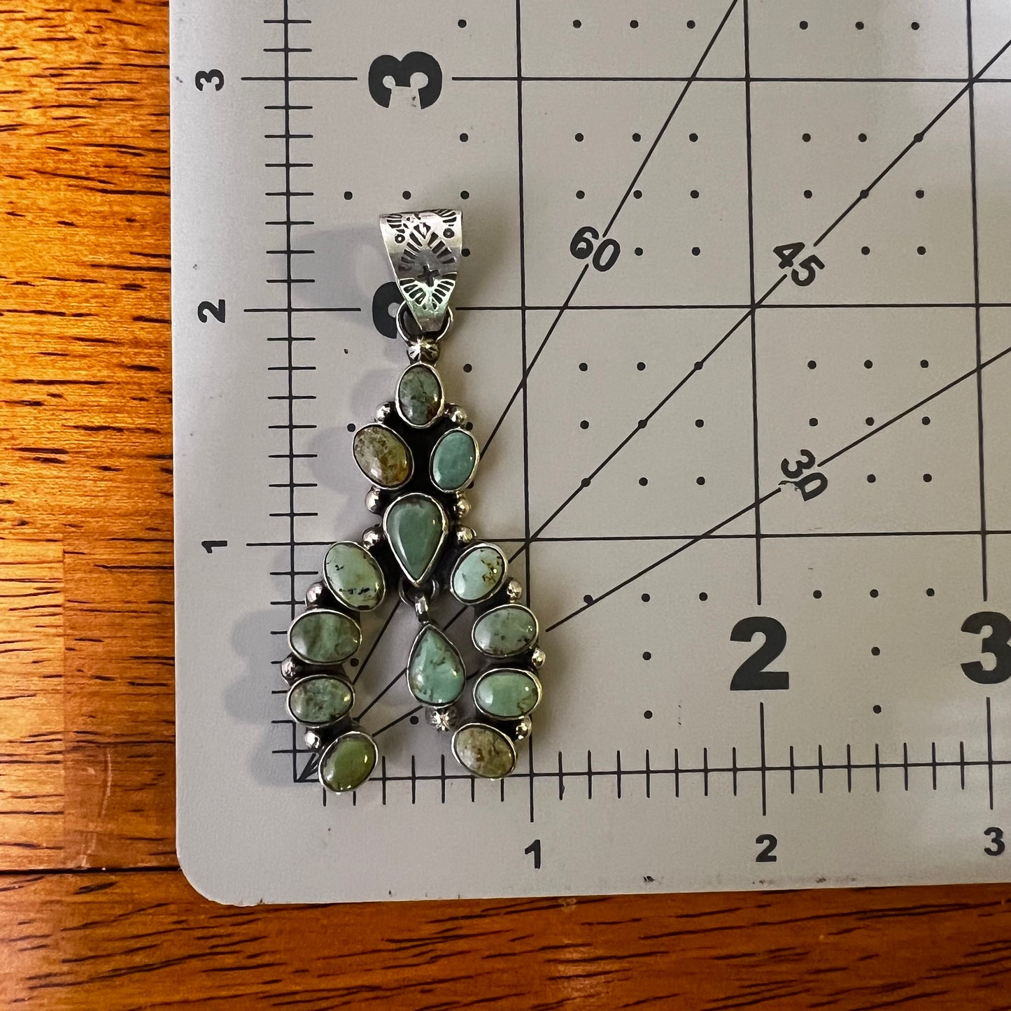 Kingman Turquoise Cluster Naja Pendant – Sterling Silver Southwestern