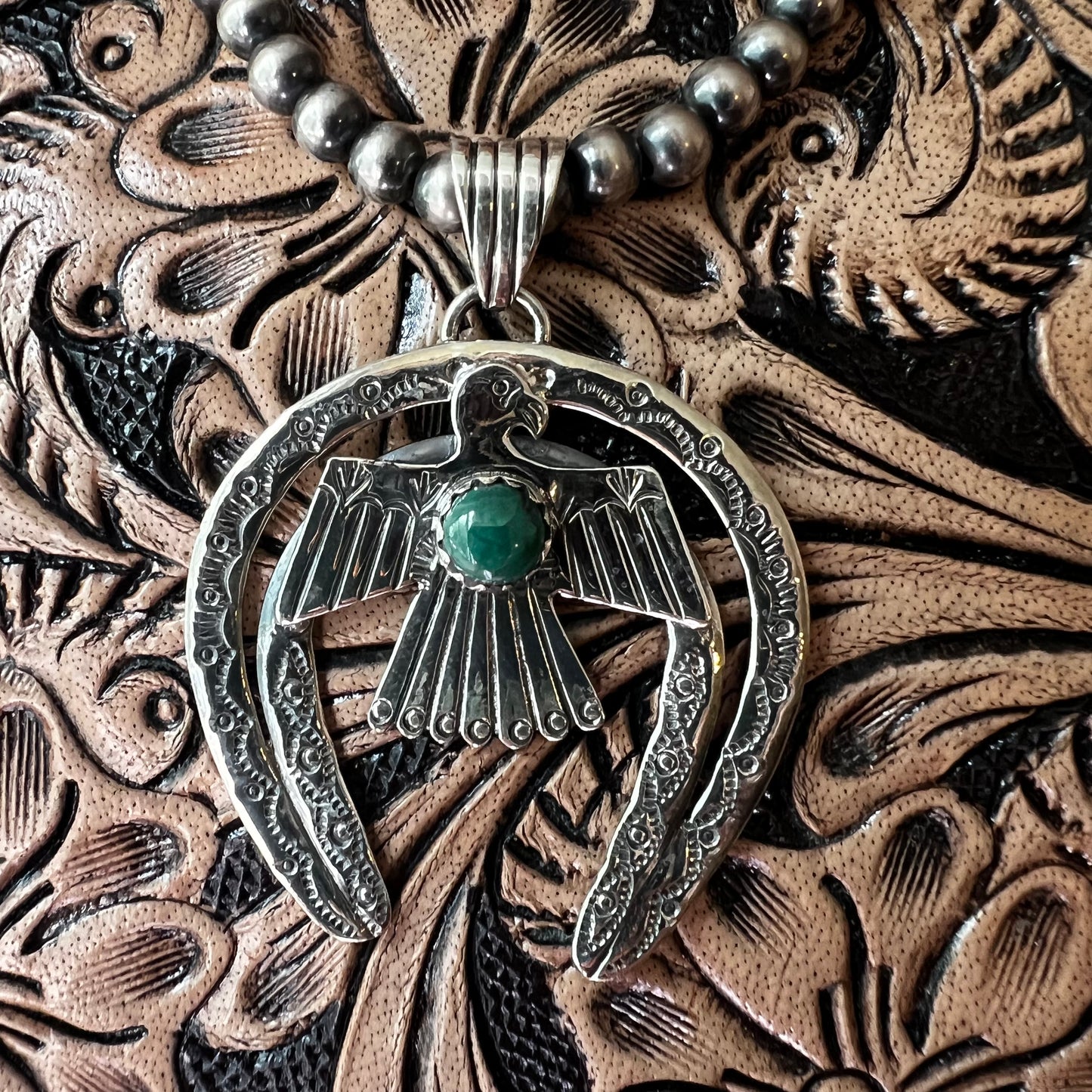 Kingman Turquoise Thunderbird Naja Pendant | Sterling Silver