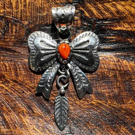 Spiny Oyster Bow Pendant in Sterling Silver with Feather Drop