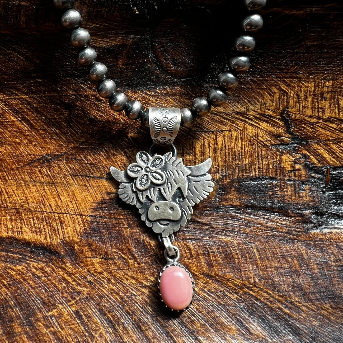 Sterling Silver Highland Cow Pendant with Queen Conch