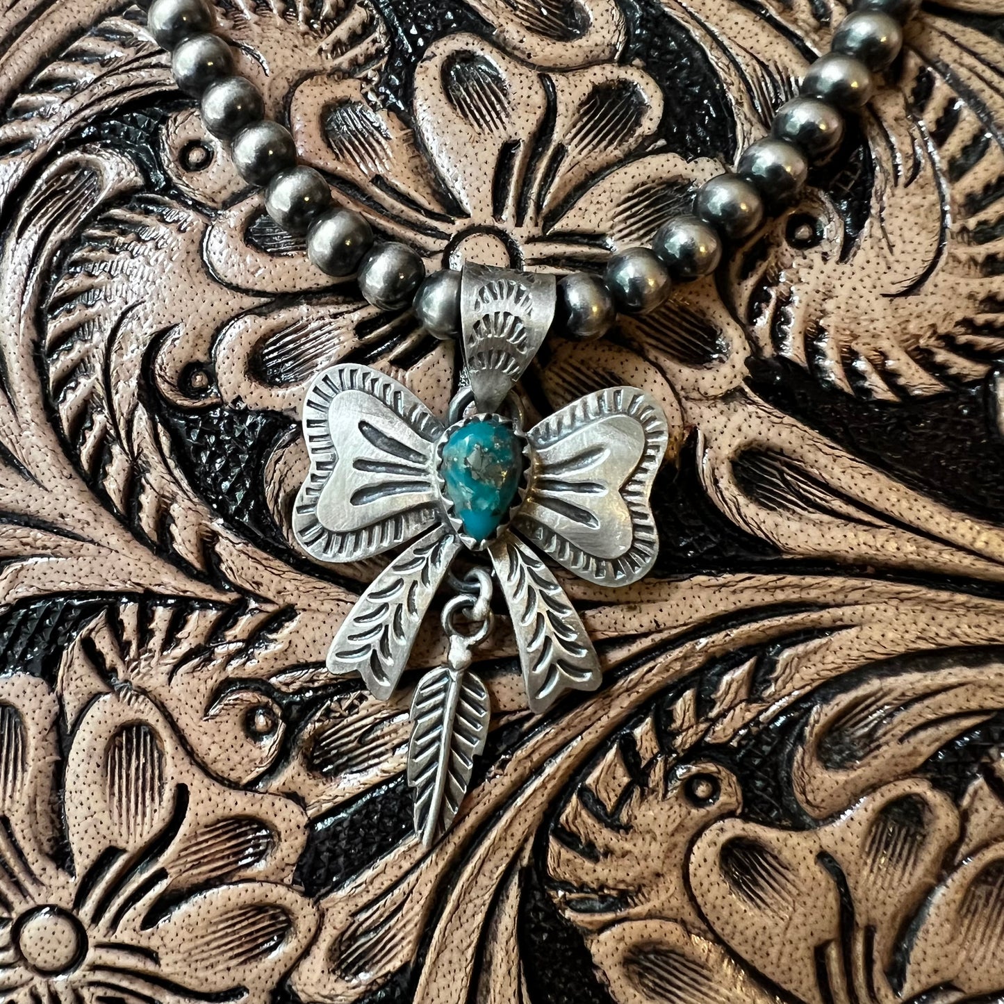 Sterling Silver Kingman Turquoise Bow Pendant