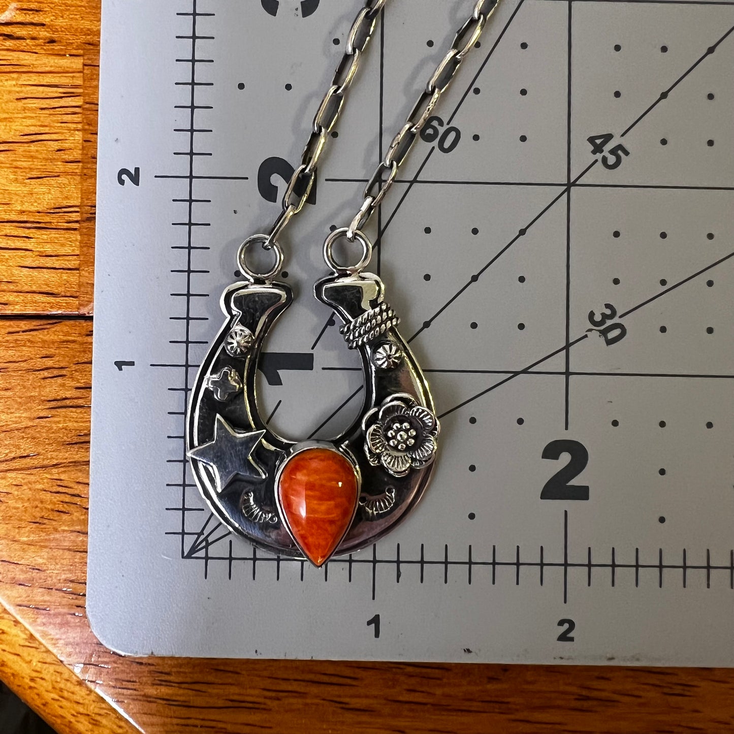 Sterling Silver Spiny Oyster Horseshoe Necklace with Floral & Star Details