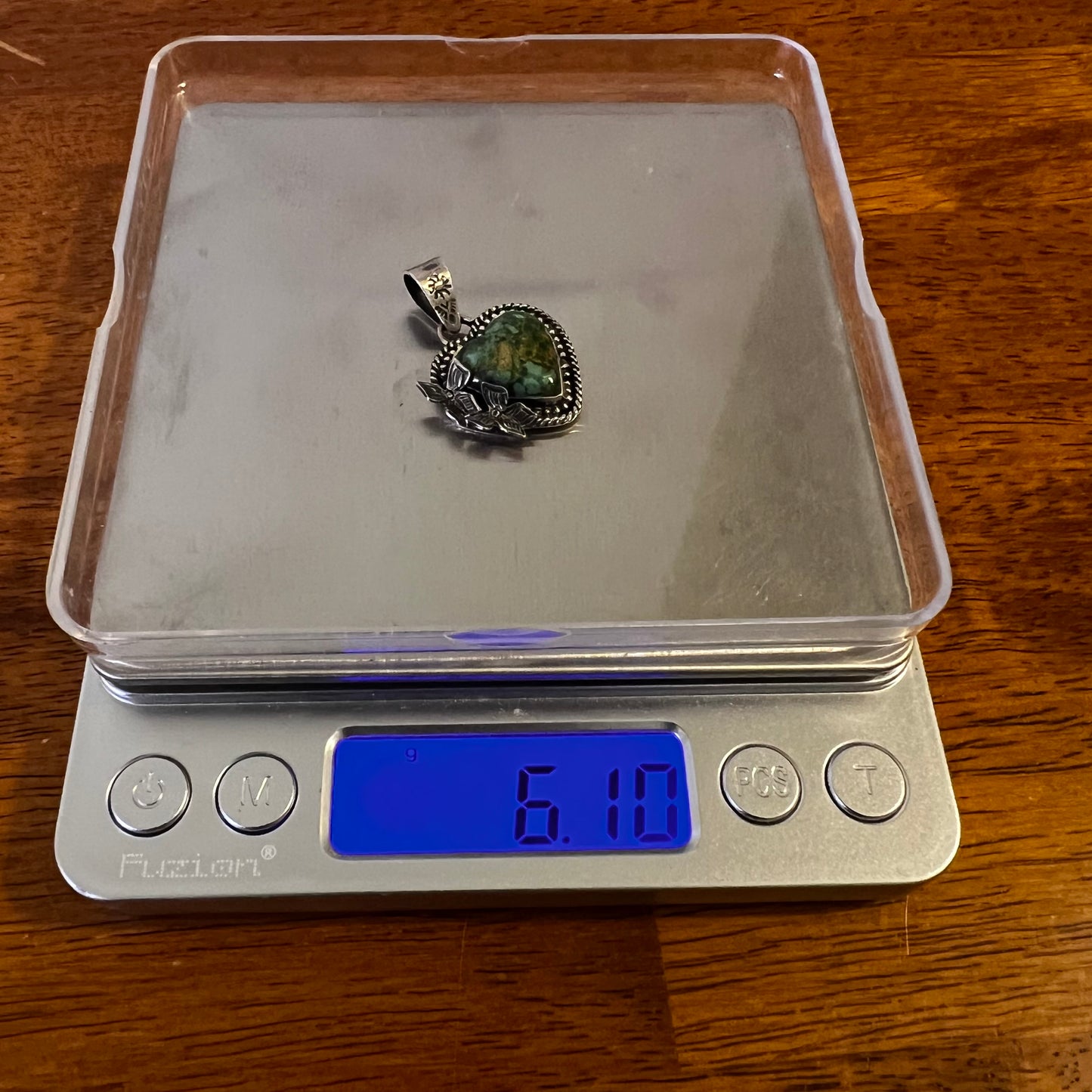 Heart Butterfly Pendant
Handcrafted Sterling Silver & Green Kingman Turquoise