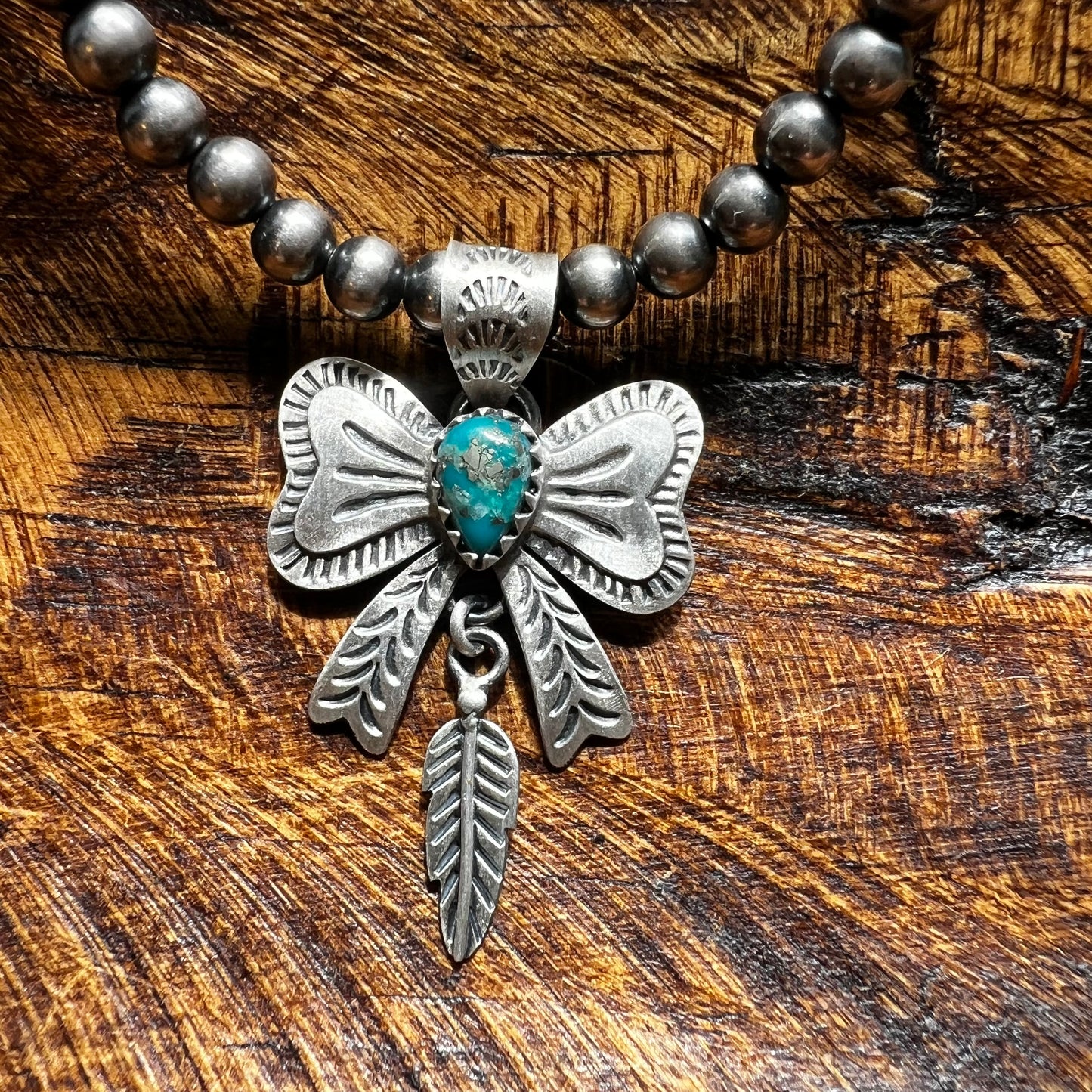 Sterling Silver Kingman Turquoise Bow Pendant
