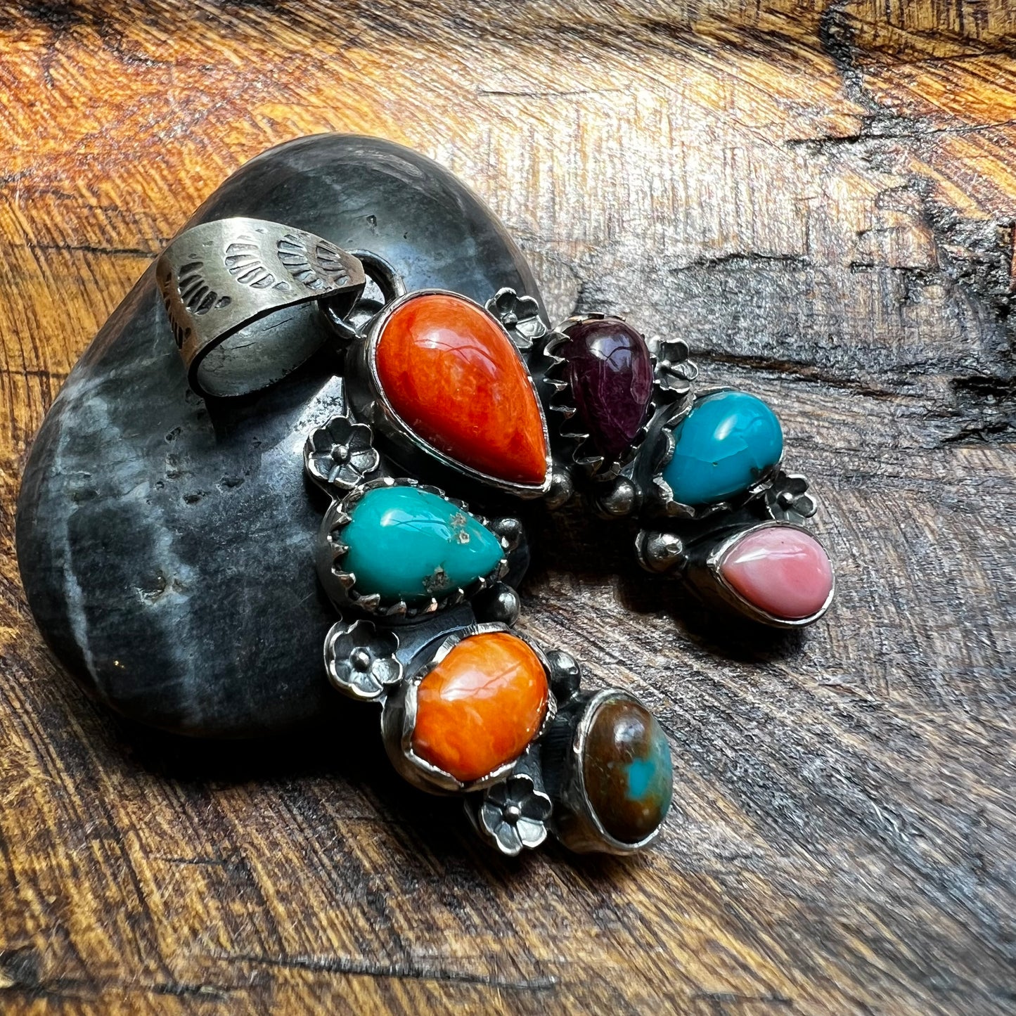 Website Title

Multi-Stone Sterling Silver Naja Pendant | Turquoise, Spiny Oyster & Queen Conch