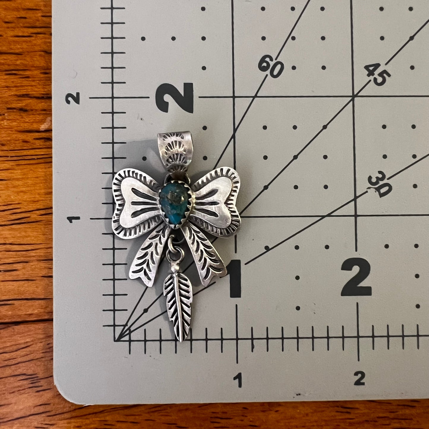Sterling Silver Kingman Turquoise Bow Pendant