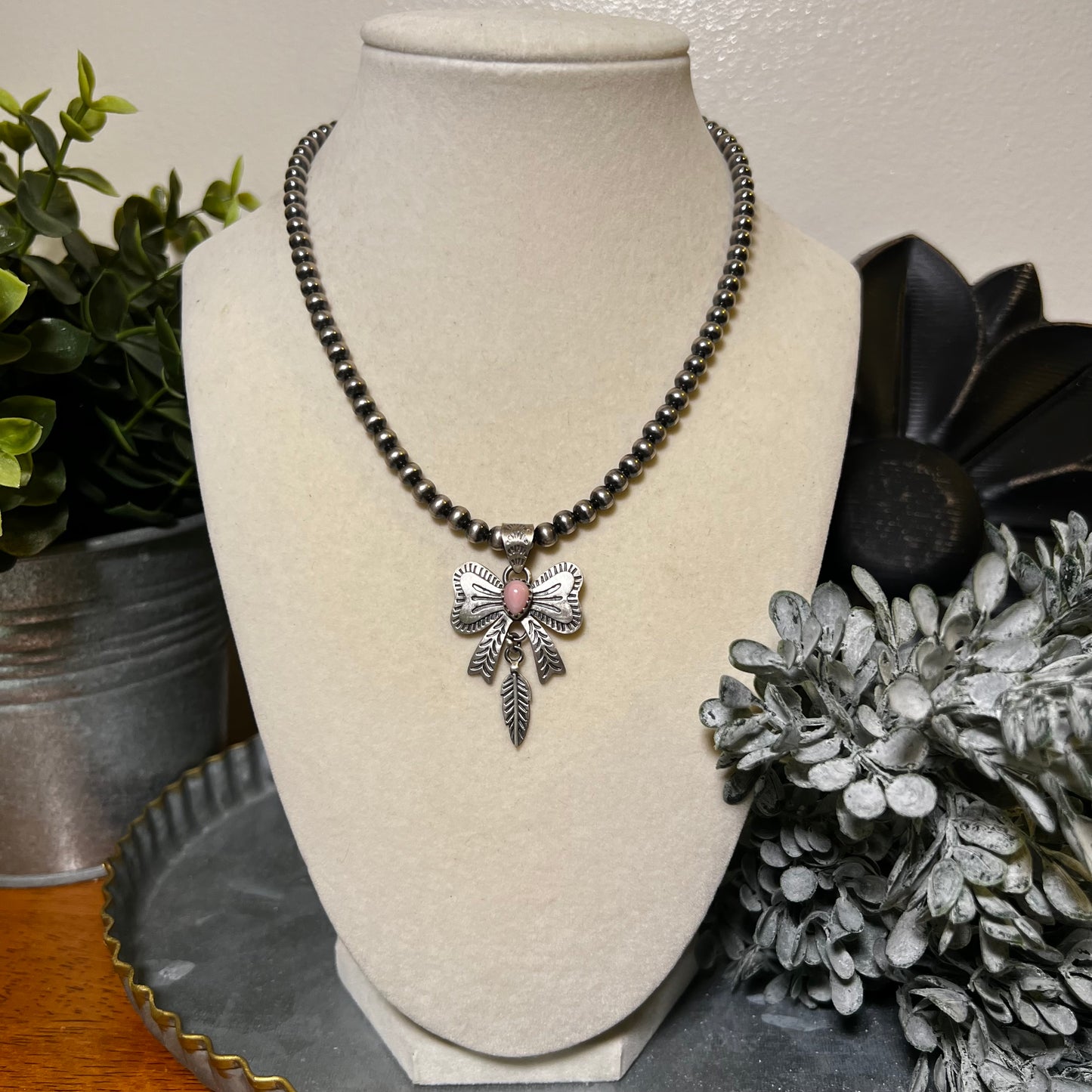 Sterling Silver Queen Conch Bow Pendant with Feather Dangle