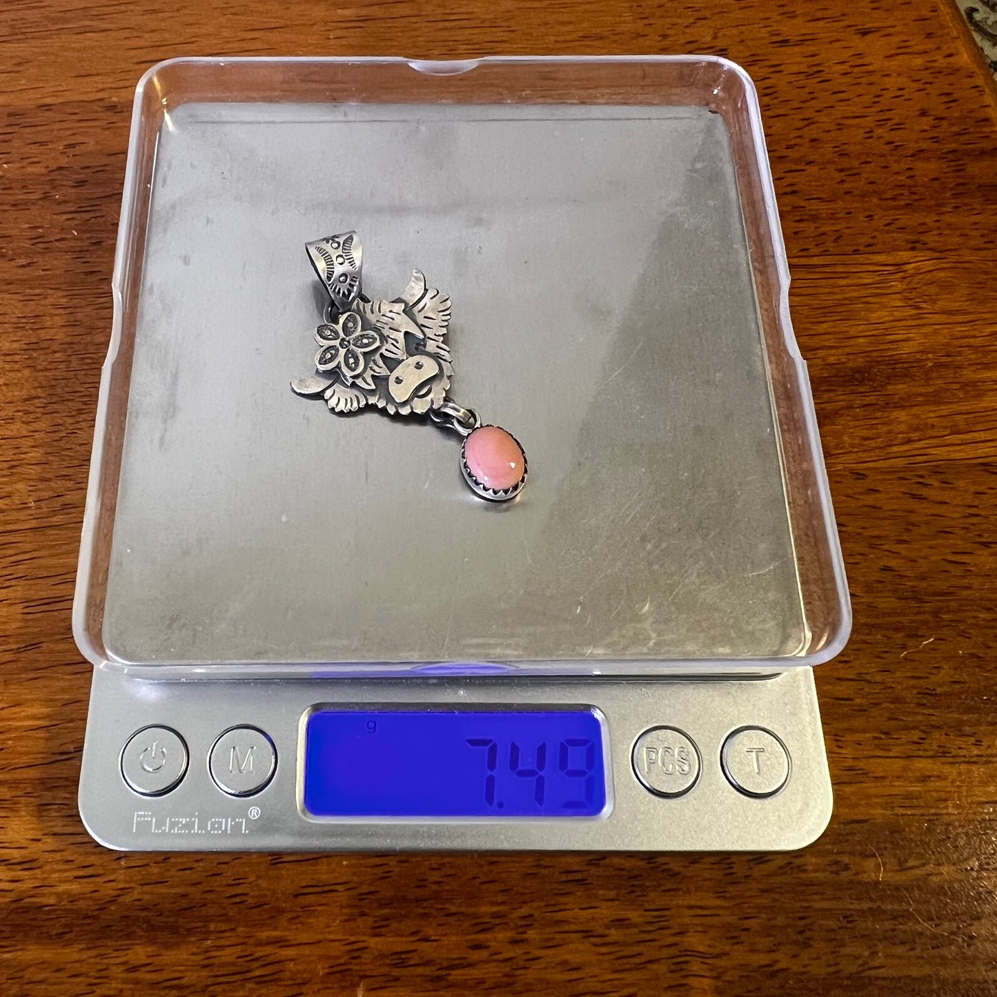 Sterling Silver Highland Cow Pendant with Queen Conch