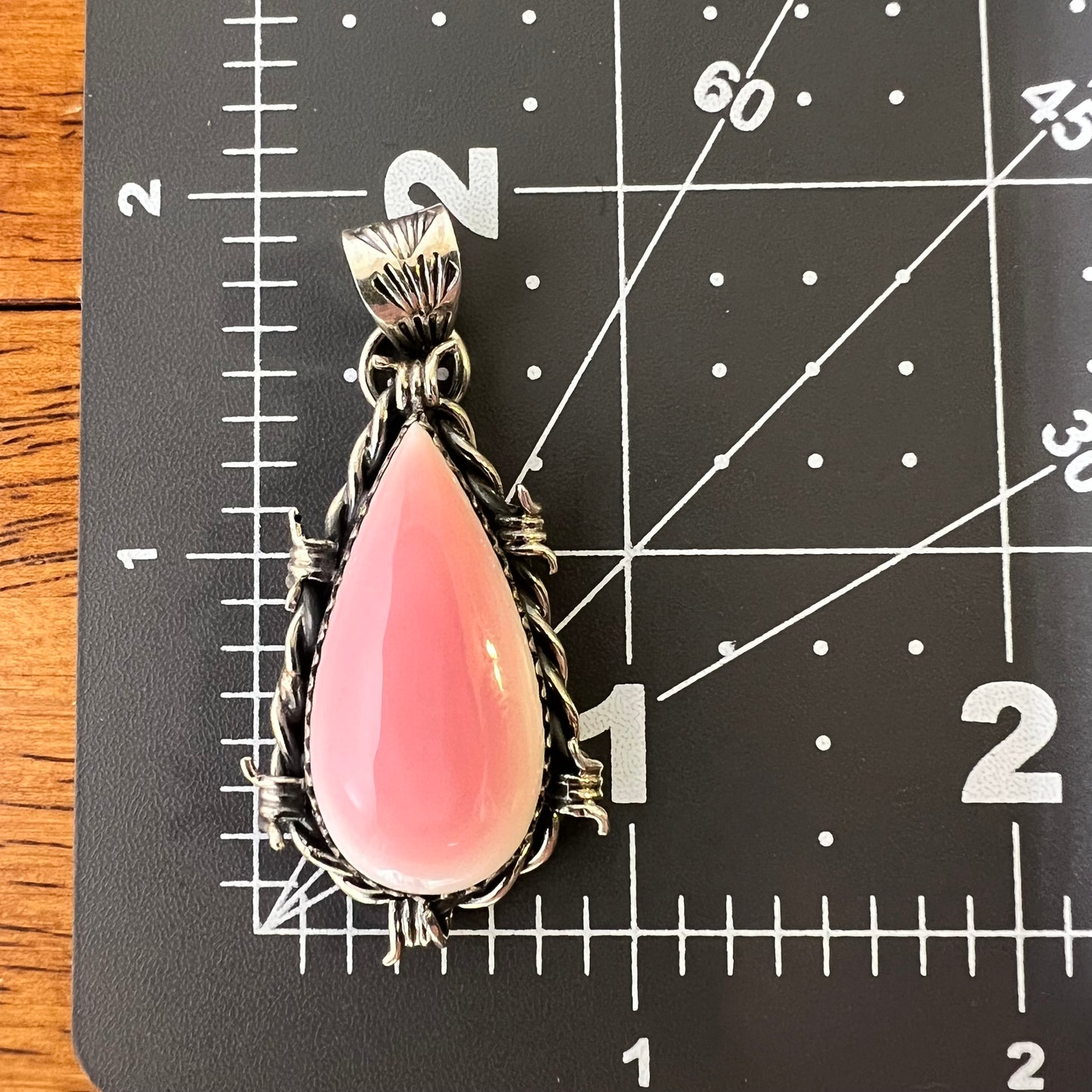 Sterling Queen Conch Barbed Wire Teardrop Pendant