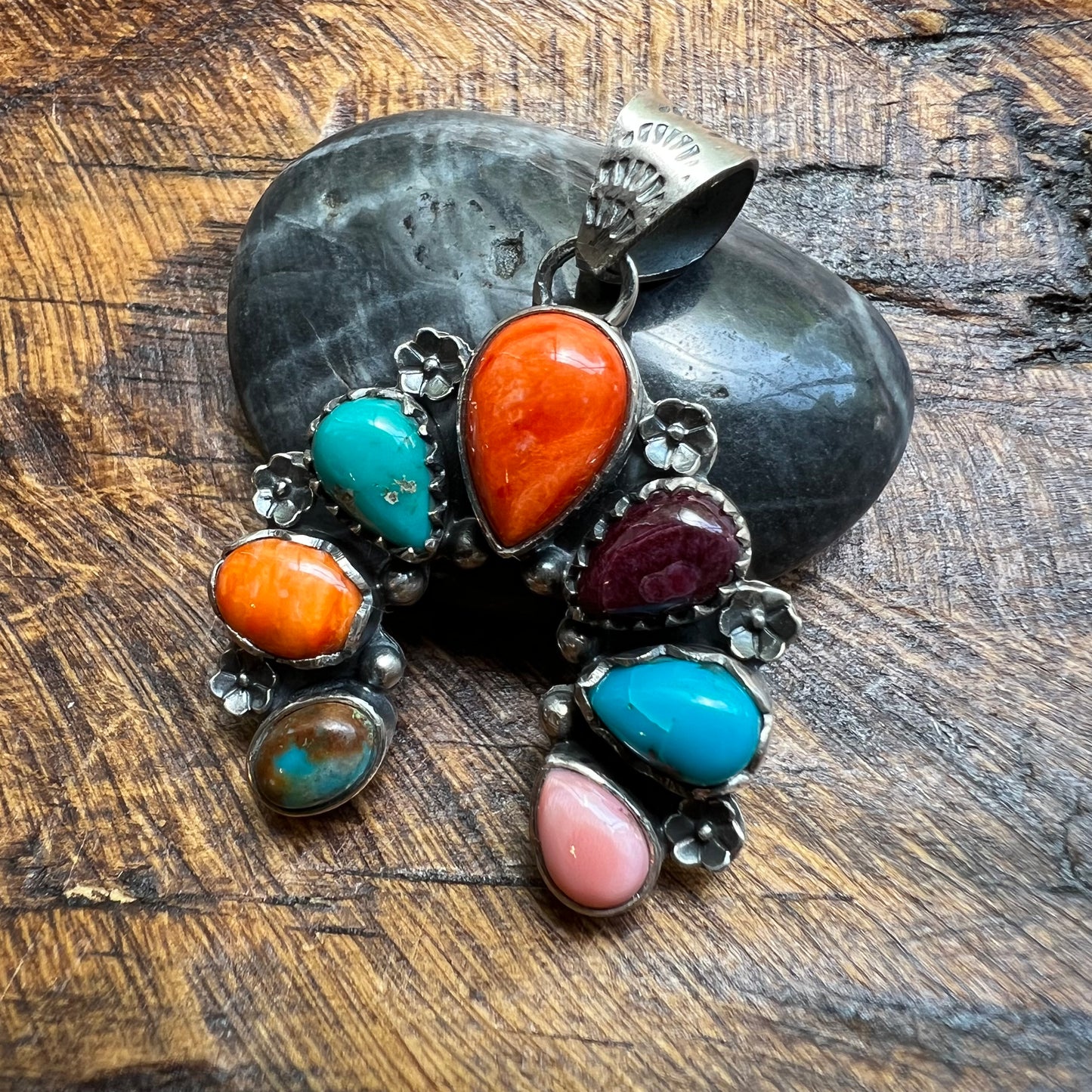 Website Title

Multi-Stone Sterling Silver Naja Pendant | Turquoise, Spiny Oyster & Queen Conch