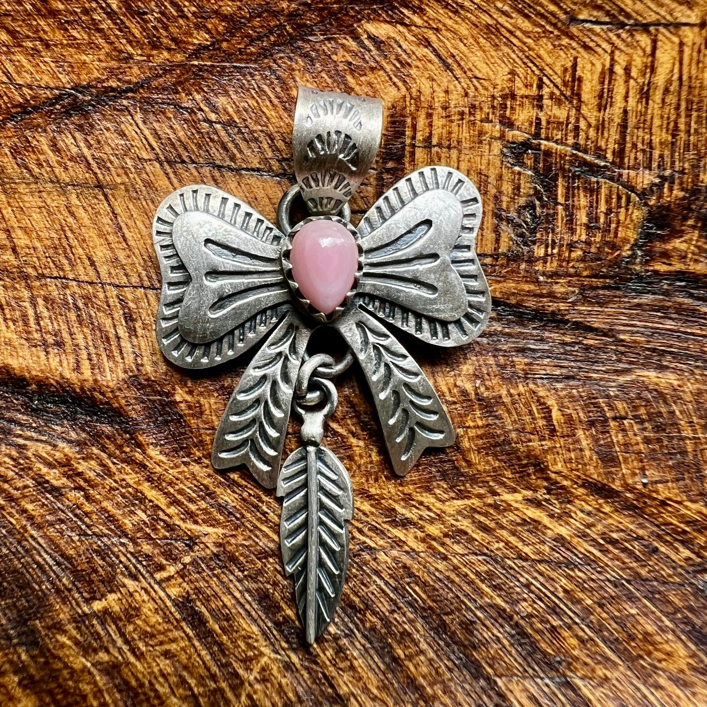 Sterling Silver Queen Conch Bow Pendant with Feather Dangle