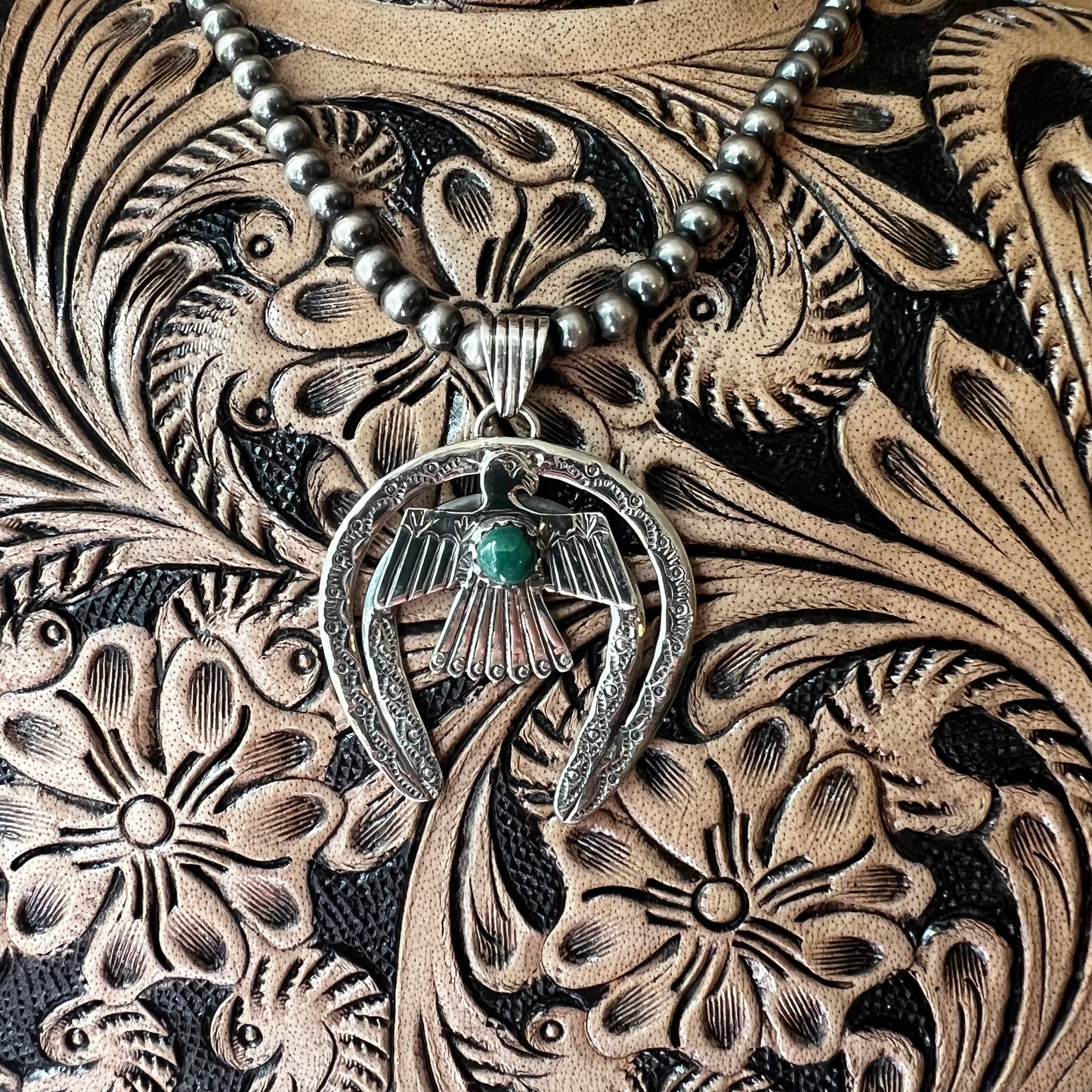 Kingman Turquoise Thunderbird Naja Pendant | Sterling Silver