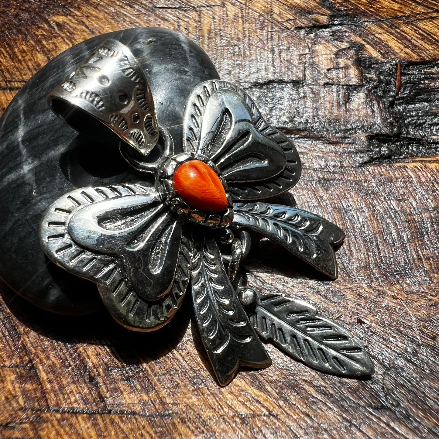 Spiny Oyster Bow Pendant in Sterling Silver with Feather Drop