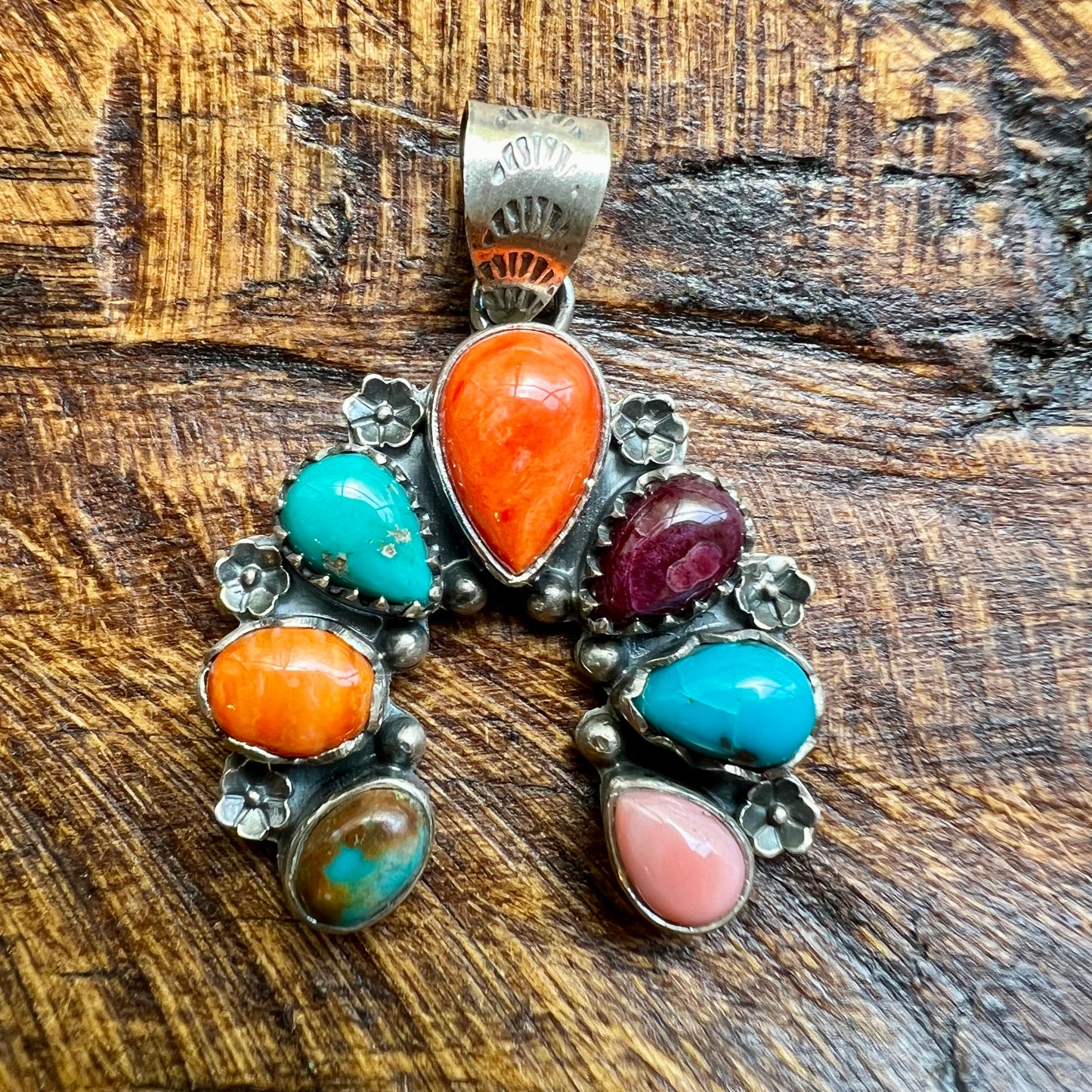 Website Title

Multi-Stone Sterling Silver Naja Pendant | Turquoise, Spiny Oyster & Queen Conch