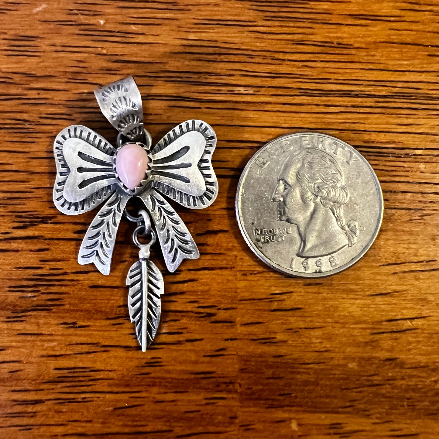 Sterling Silver Queen Conch Bow Pendant with Feather Dangle