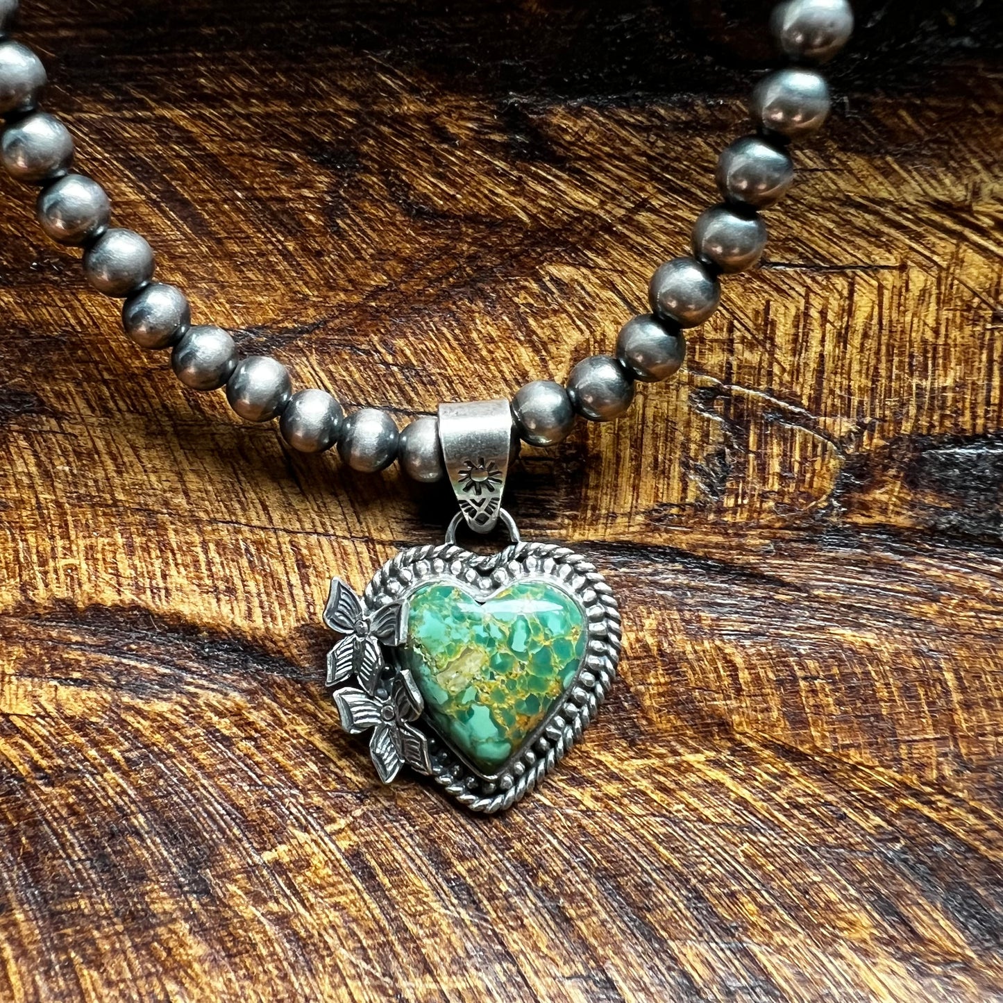 Heart Butterfly Pendant
Handcrafted Sterling Silver & Green Kingman Turquoise