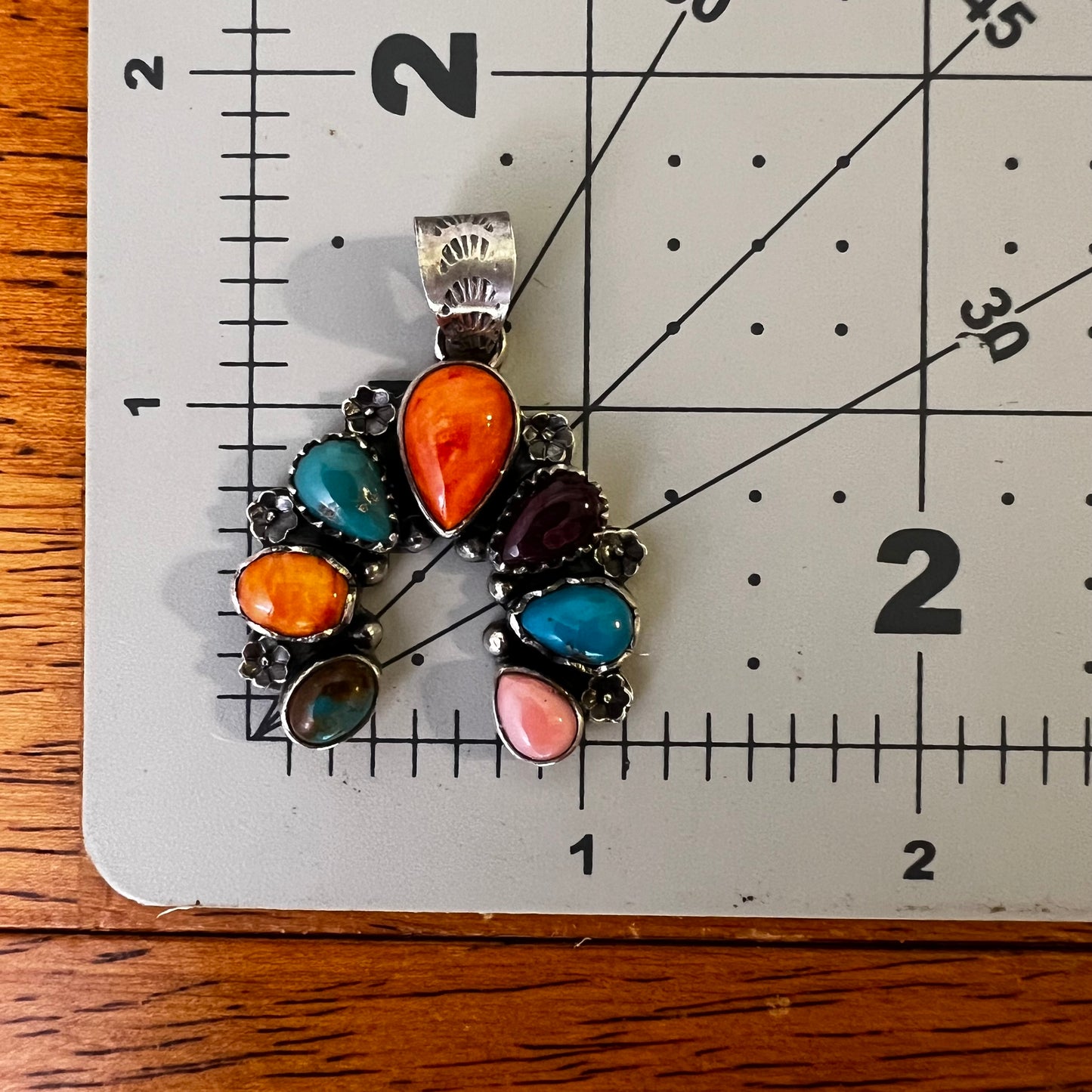 Website Title

Multi-Stone Sterling Silver Naja Pendant | Turquoise, Spiny Oyster & Queen Conch