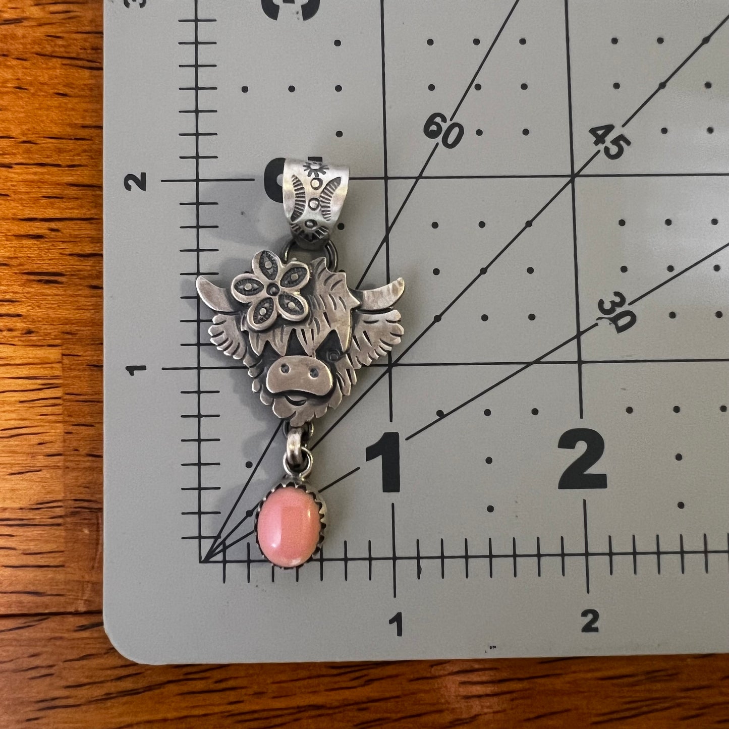 Sterling Silver Highland Cow Pendant with Queen Conch
