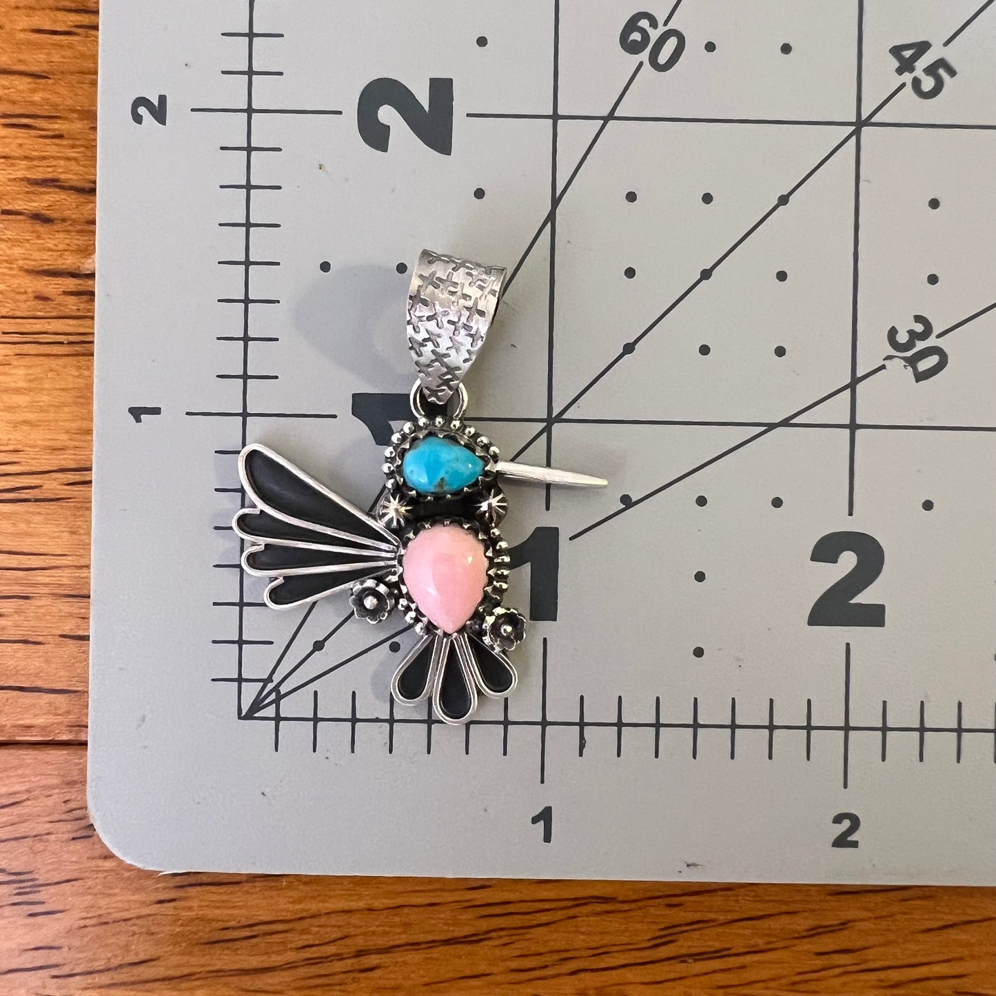 Sterling Silver Kingman Turquoise Queen Conch Hummingbird Pendant