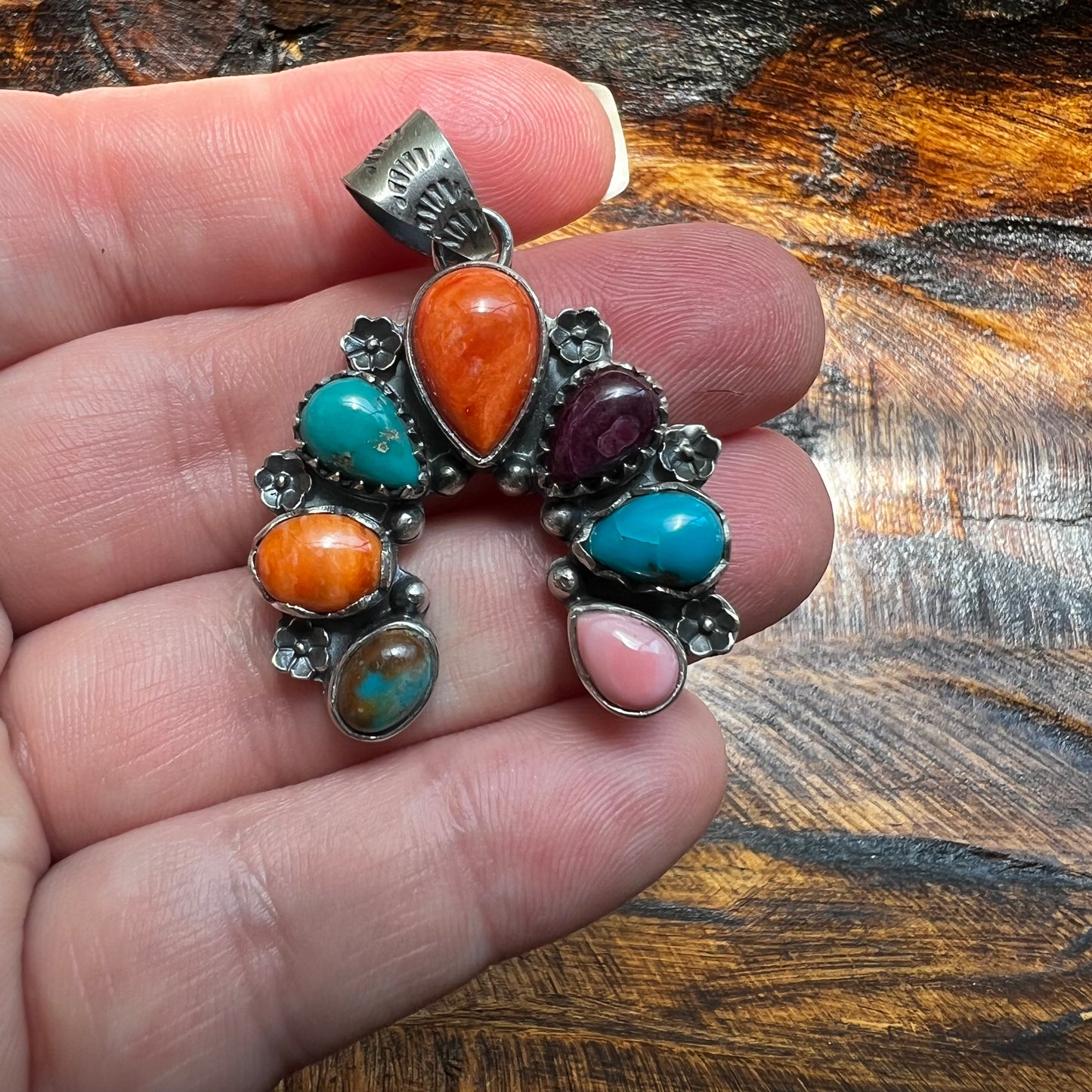 Website Title

Multi-Stone Sterling Silver Naja Pendant | Turquoise, Spiny Oyster & Queen Conch