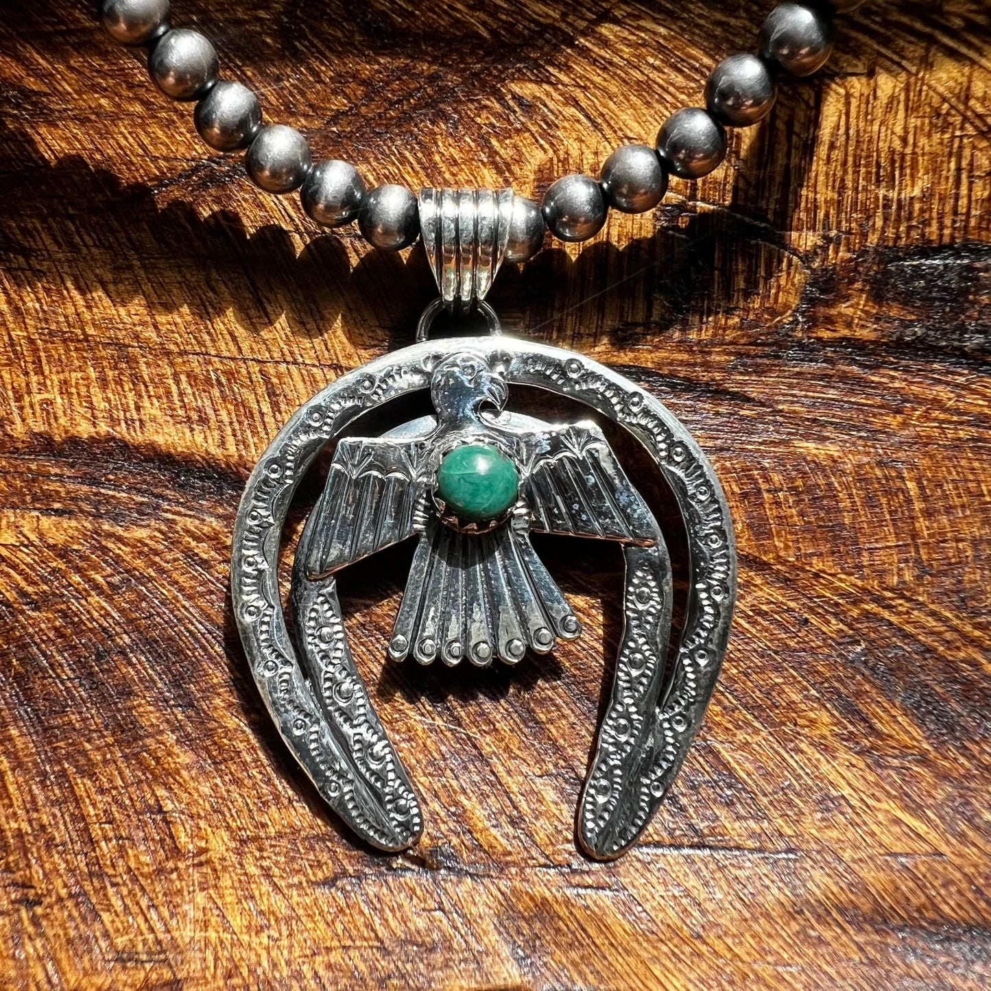 Kingman Turquoise Thunderbird Naja Pendant | Sterling Silver