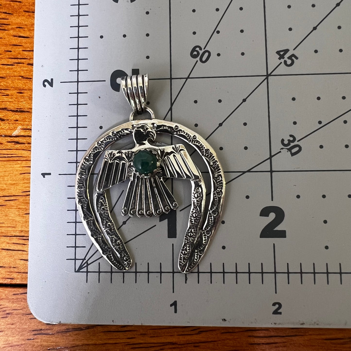 Kingman Turquoise Thunderbird Naja Pendant | Sterling Silver